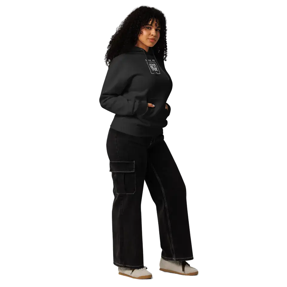 A woman wearing the Black Heavyweight Hoodie, side view. Our print partner’s mockup with our print file.