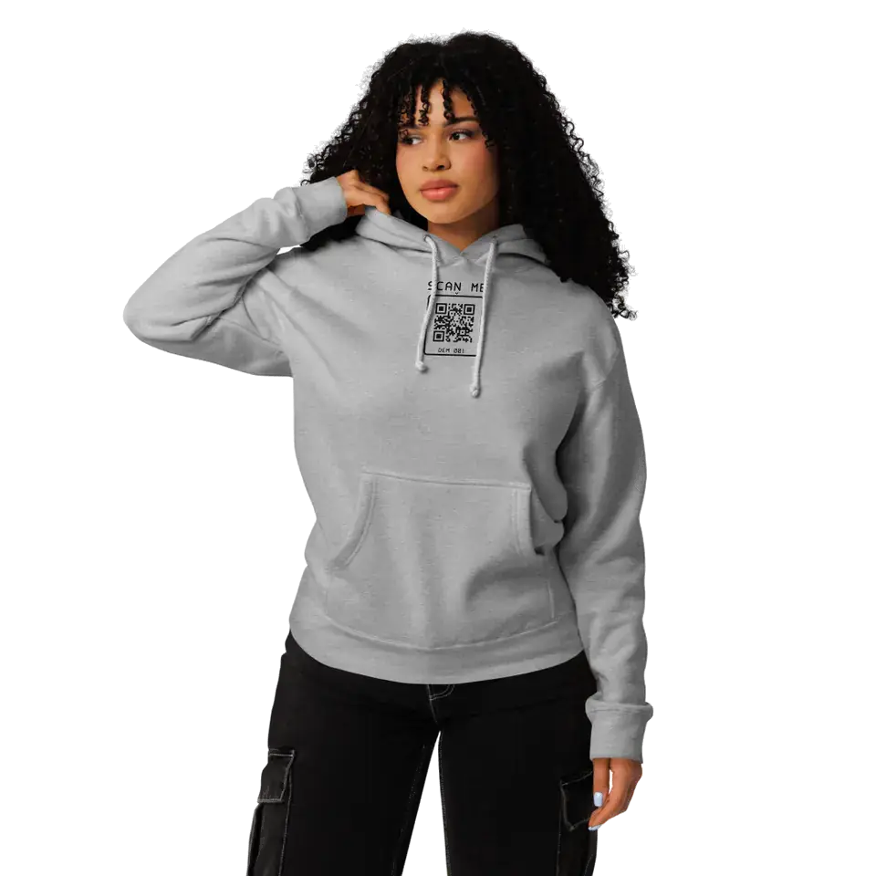 A woman wearing the Grey Heather Heavyweight Hoodie, front view. Our print partner’s mockup with our print file.