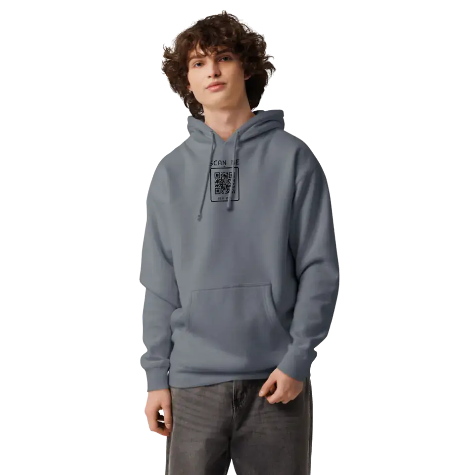 A man wearing the Storm Blue Heavyweight Hoodie, front view. Our print partner’s mockup with our print file.