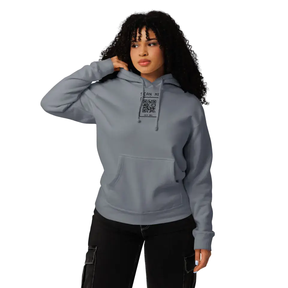 A woman wearing the Storm Blue Heavyweight Hoodie, front view. Our print partner’s mockup with our print file.